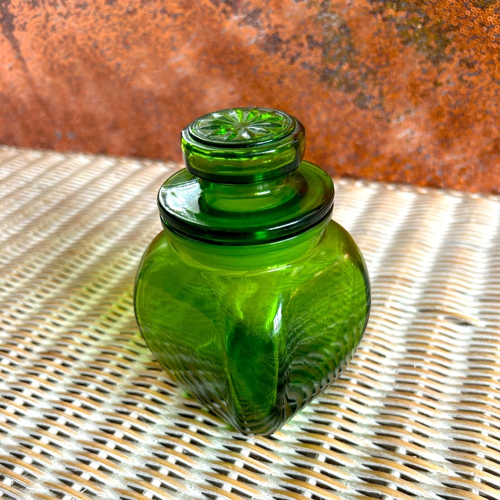 vintage Wheaton emerald green glass canister with a decorative lid small
